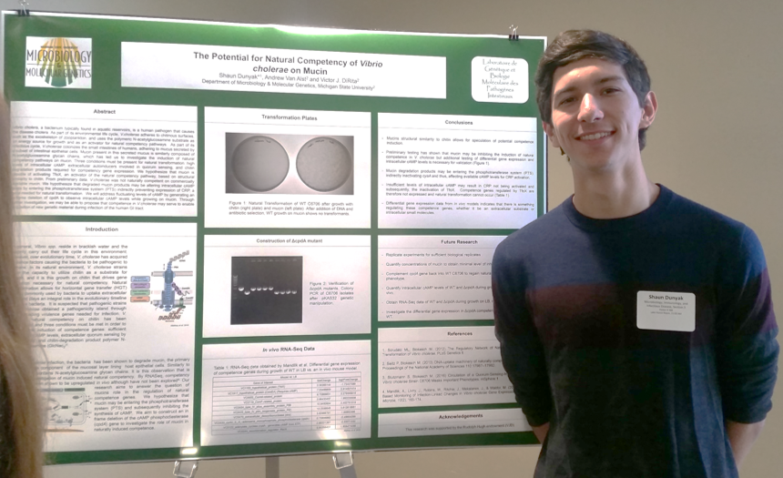Shaun and his poster at 2017 University Undergraduate Research and Arts Forum (UURAF)